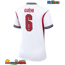 Camisa de Futebol Inglaterra Marc Guehi #6 Equipamento Principal Mulheres Mundo 2026 Manga Curta
